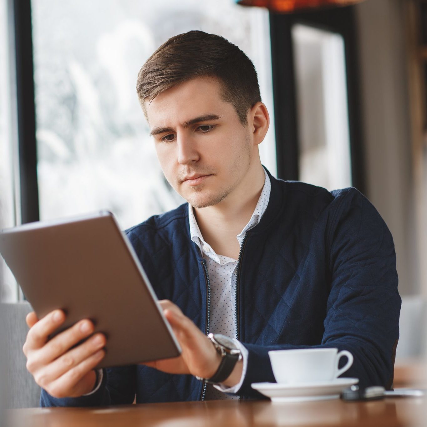 bigstock-Handsome-Man-Drinking-Coffee-A-118358801